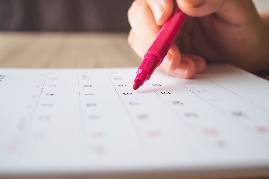 Red Pen Circling Date on Calendar