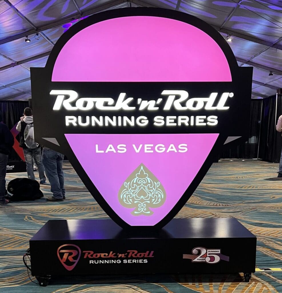 2023 Rock 'n' Roll Running Series Las Vegas Pick stands in convention hall