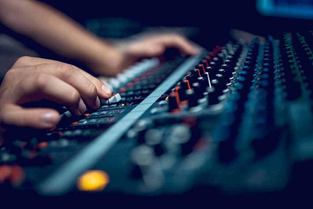 Hands Control Gain on Sound Board
