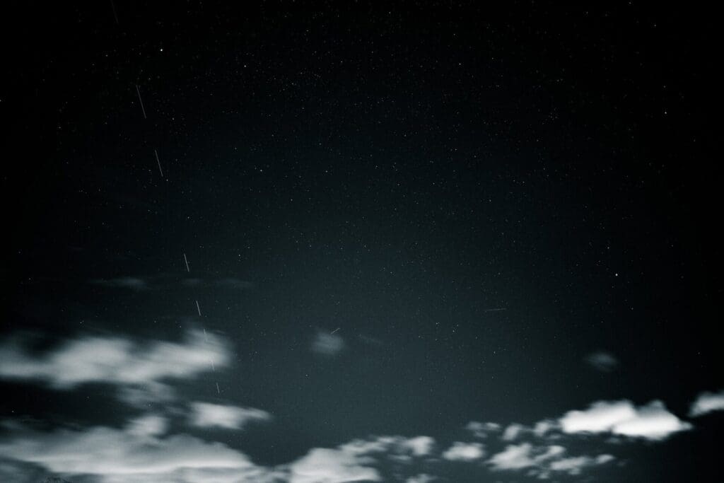 Streaks of Starlink satellites' lights in a long exposure.