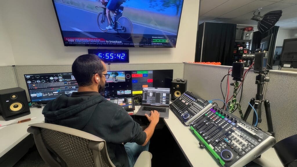 Man working in broadcast desk at tricaster